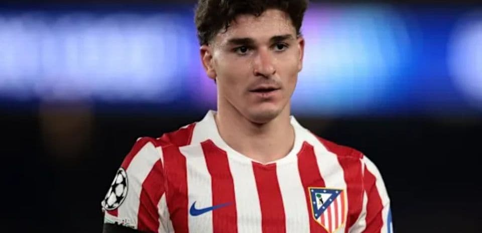 Atletico Madrid player in home jersey during match