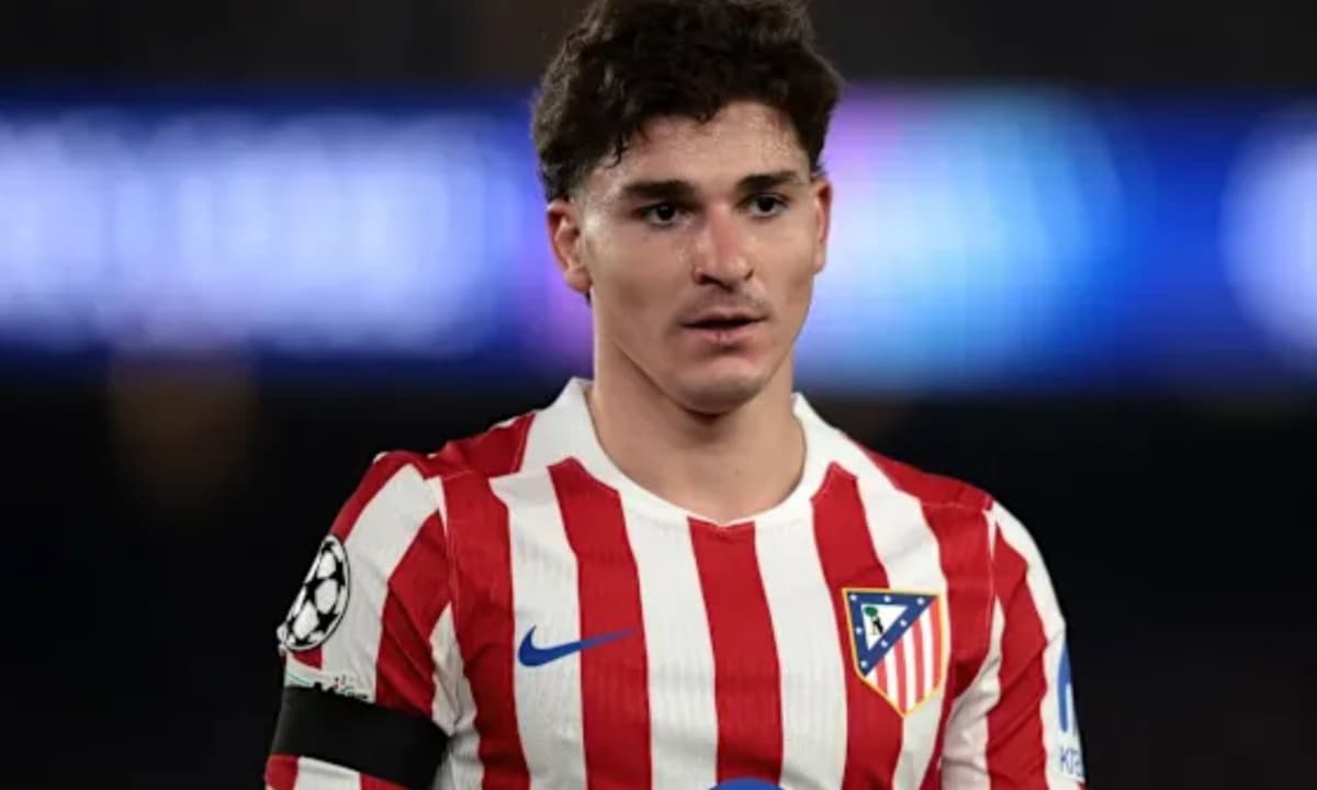 Atletico Madrid player in home jersey during match