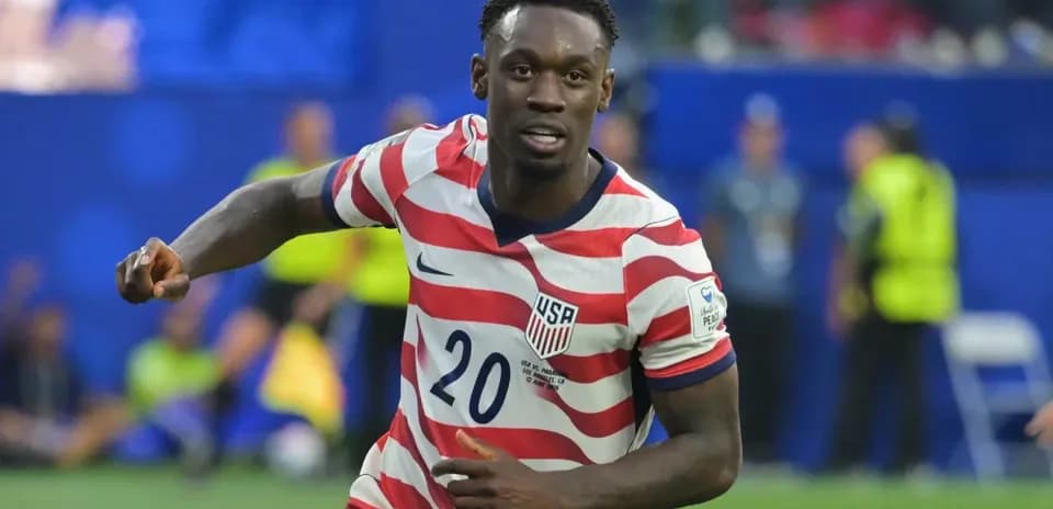 USA player celebrating after scoring a goal