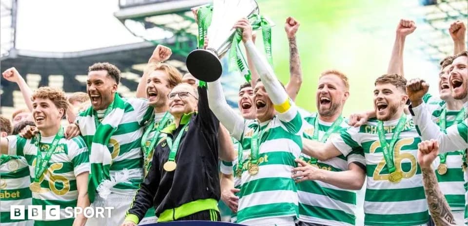Celtic players celebrating trophy victory with fans