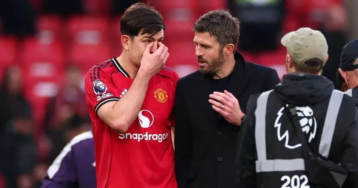 Harry Maguire speaking with Michael Carrick post-match