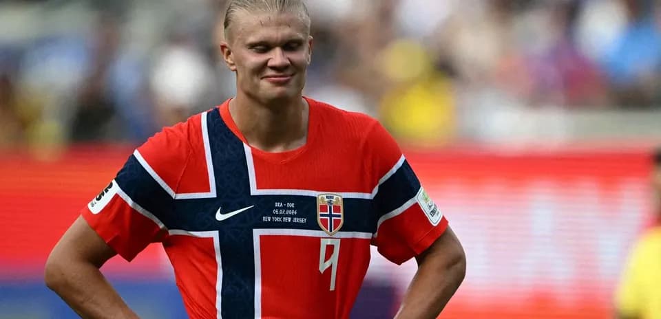 Norway player in red jersey on the field