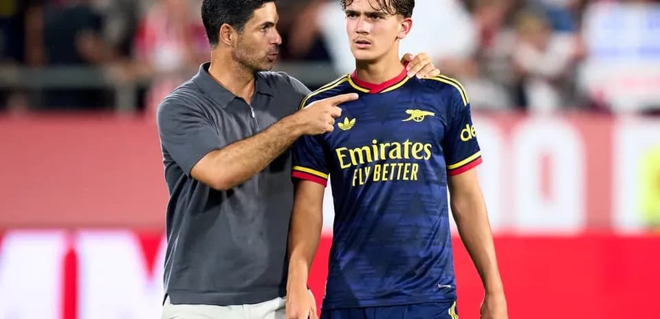 Men discussing on the field after a match