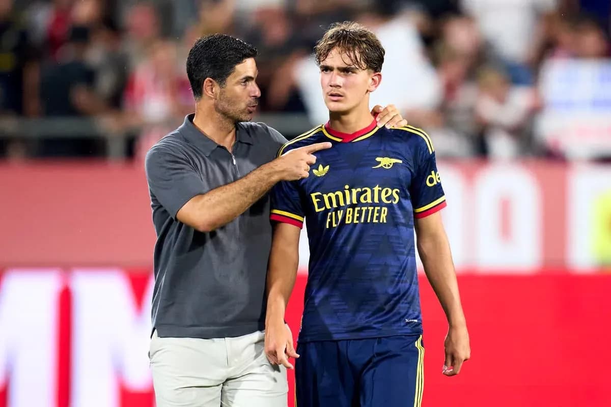 Men discussing on the field after a match