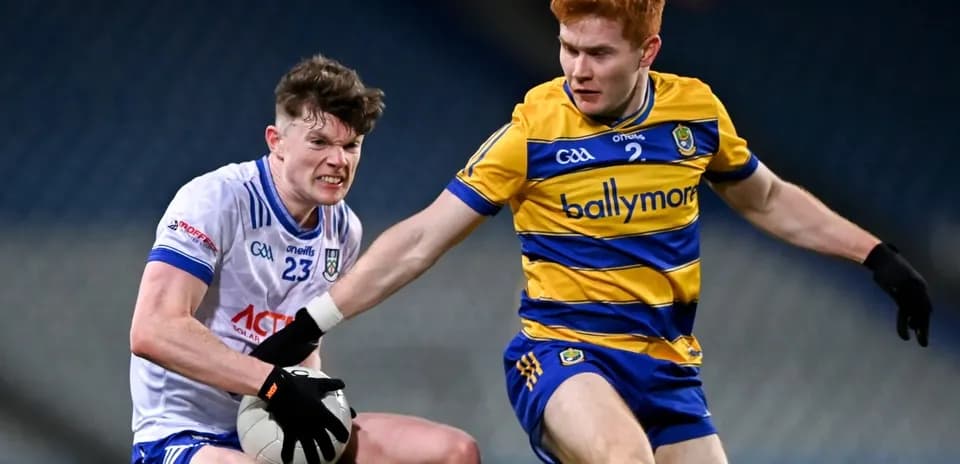 Two players contesting for the ball during a match