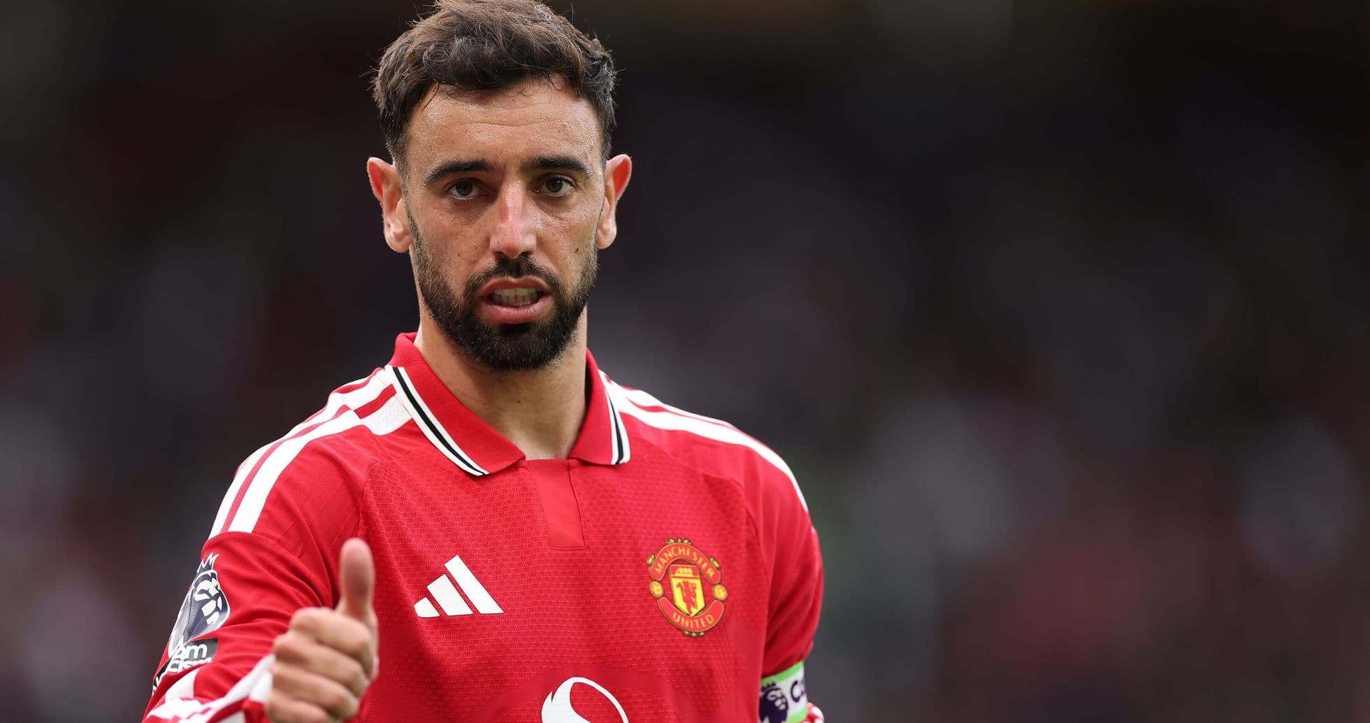 Bruno Fernandes in Manchester United jersey with thumbs up