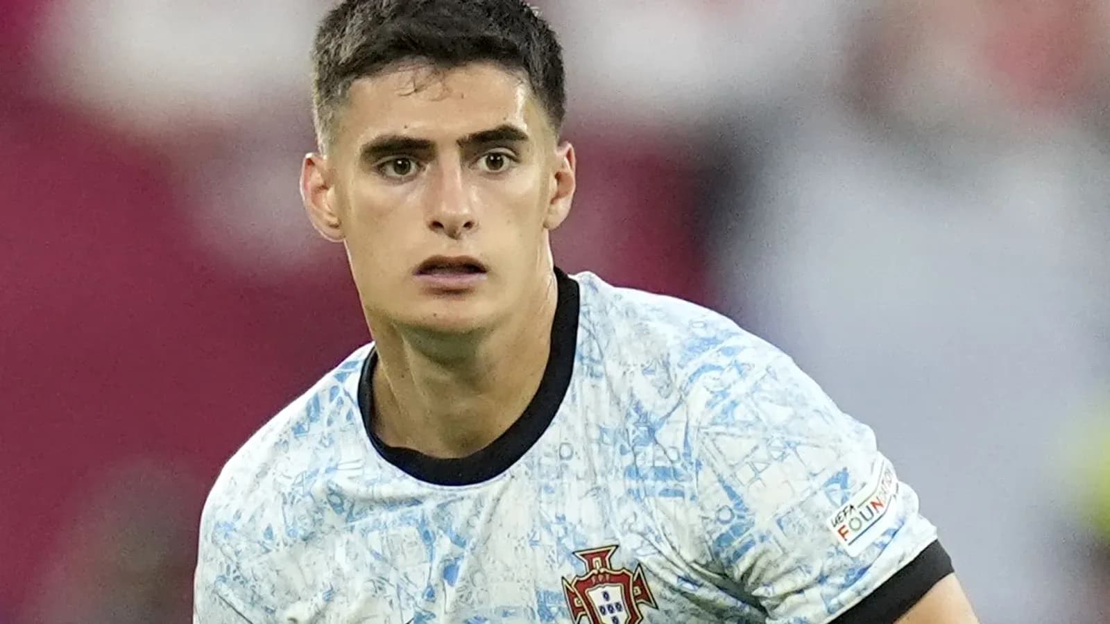 Player wearing Portugal jersey during match action