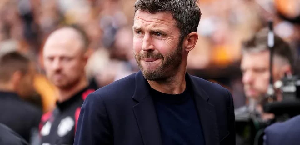 Men's football manager on the sidelines during match