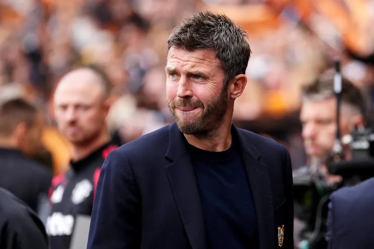 Men's football manager on the sidelines during match