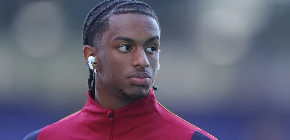 Player wearing earphones before the match