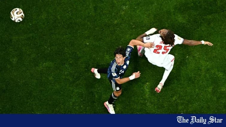 Player challenging opponent for the ball on field