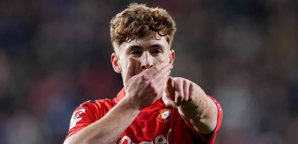Player celebrating with hand gesture on field