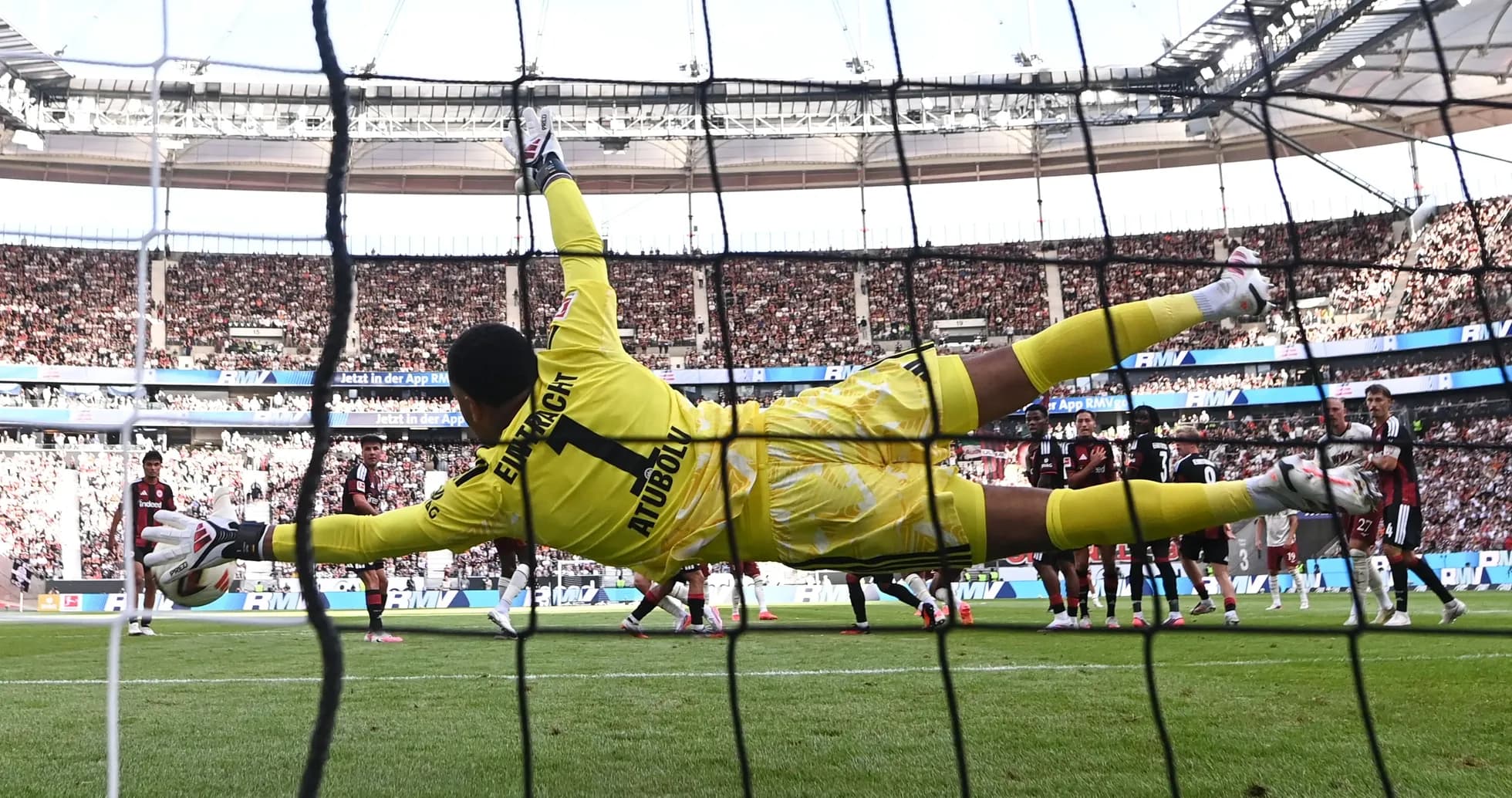 Goalkeeper diving to save a penalty kick