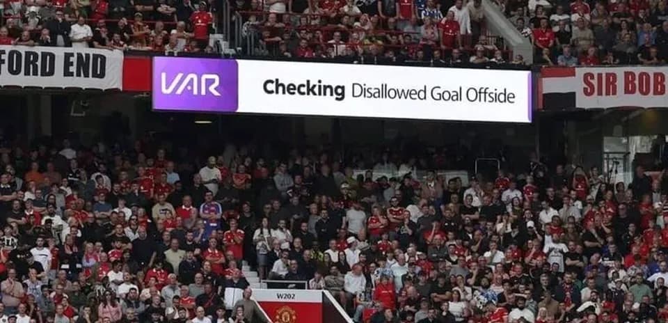Stadium crowd watching VAR disallowed goal announcement