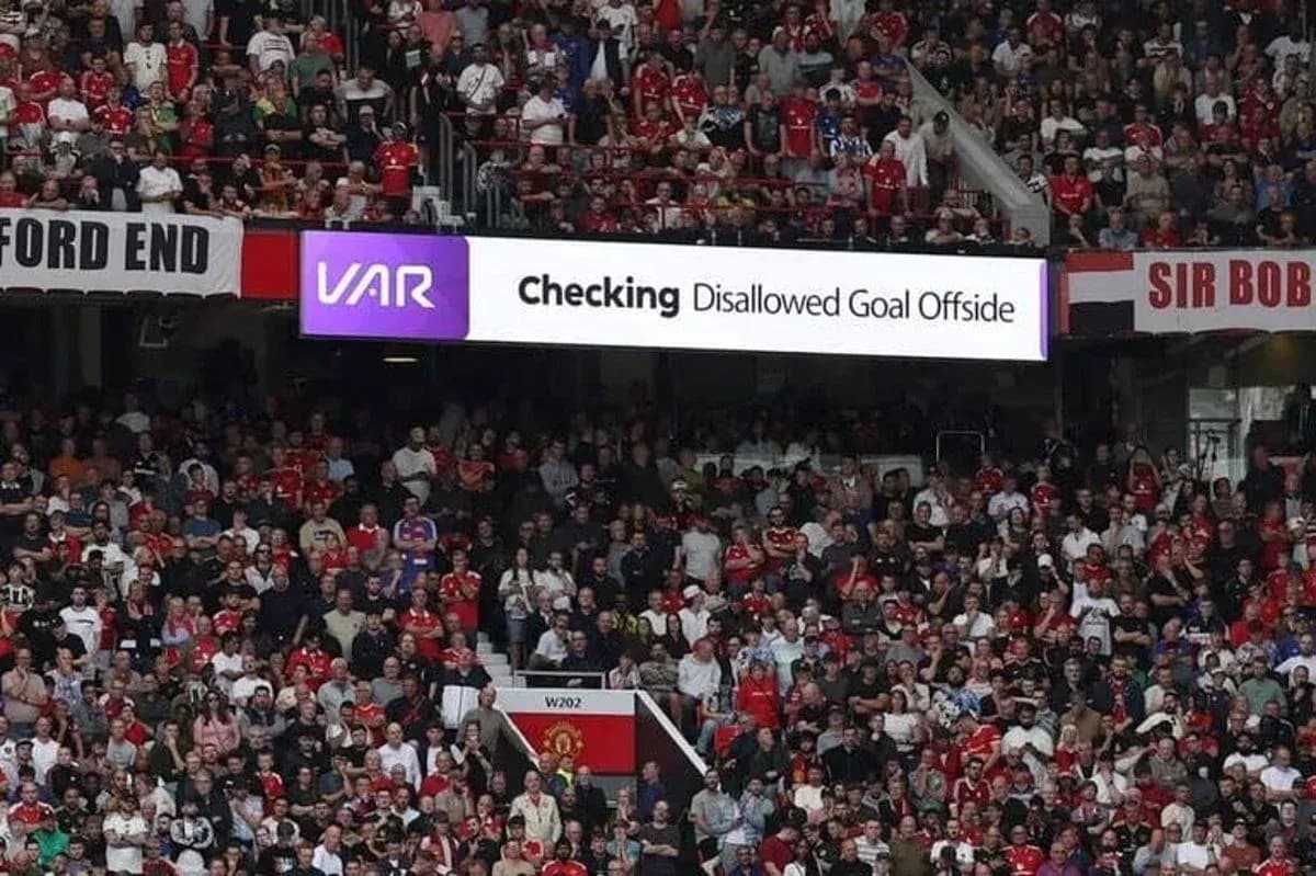 Stadium crowd watching VAR disallowed goal announcement