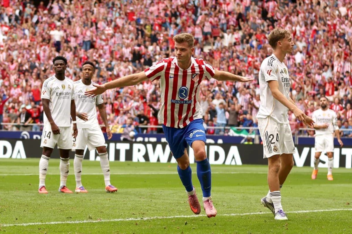 Atletico Madrid player celebrating goal against Real Madrid