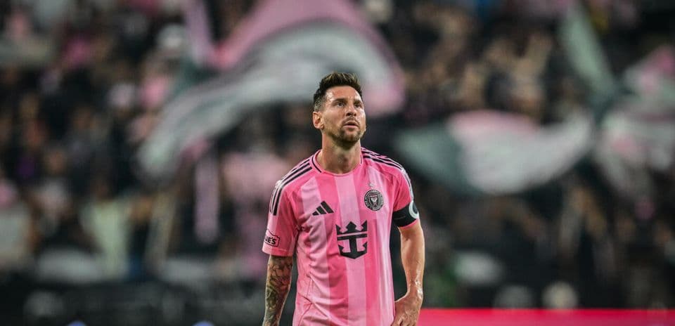 Messi in pink jersey during a match