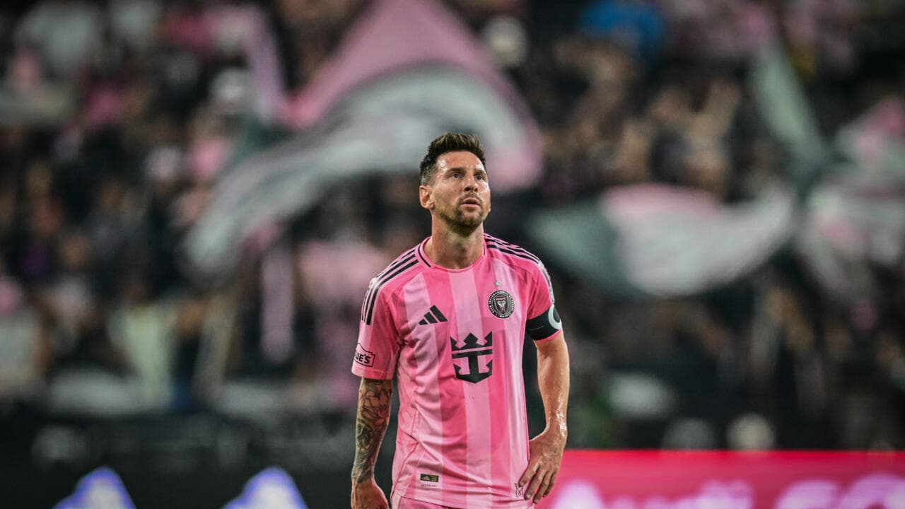 Messi in pink jersey during a match