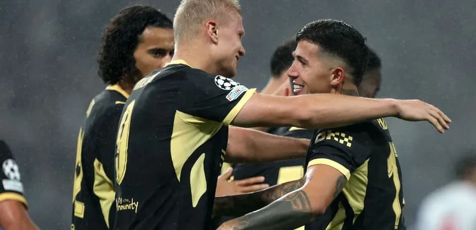 Two players celebrating a goal during match