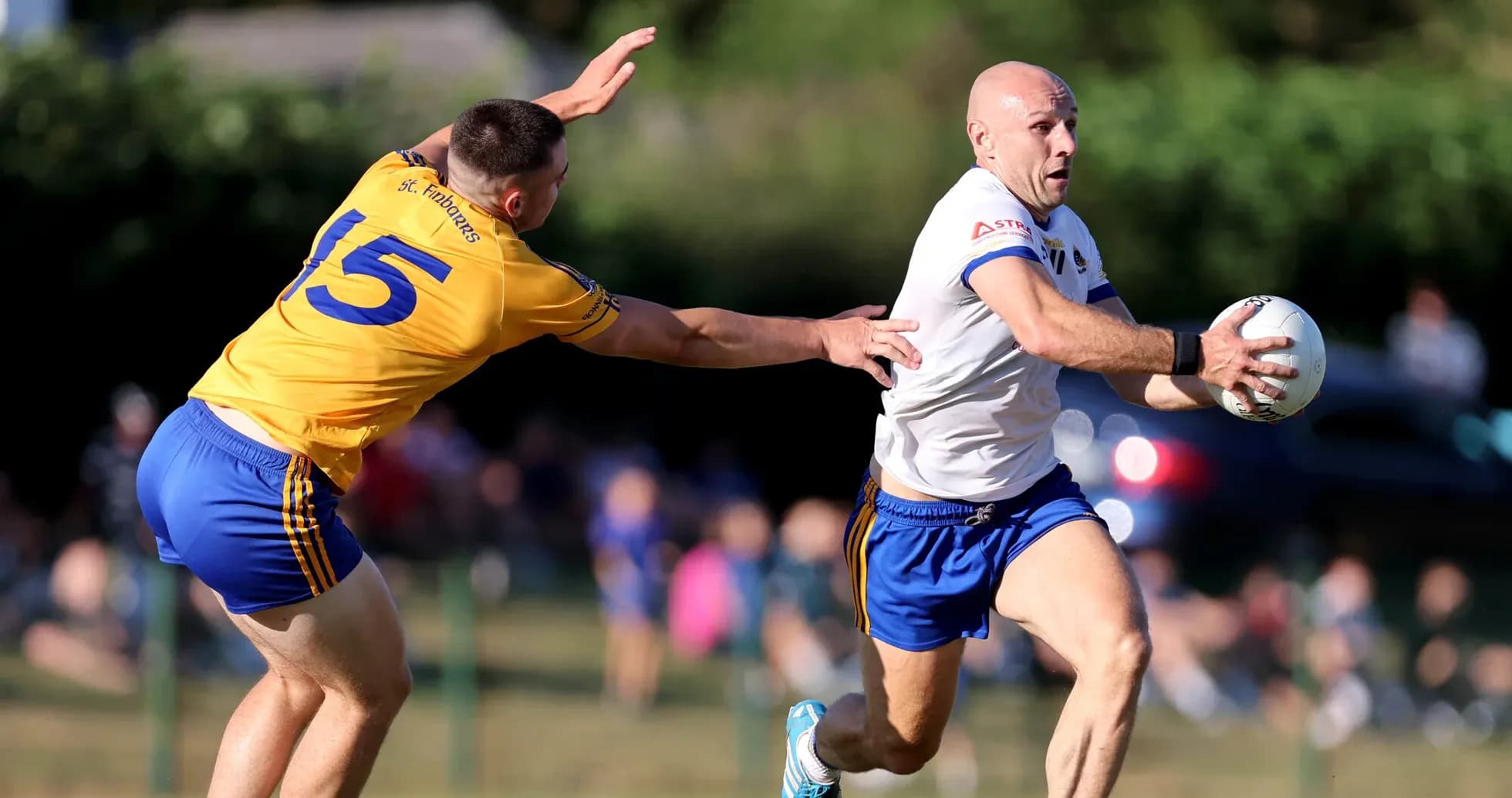 Player evading tackle while running with ball