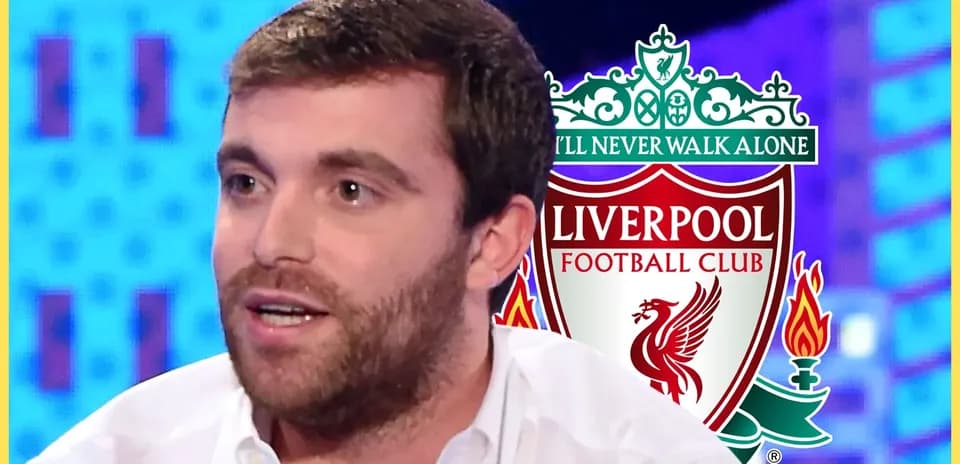 Analyst speaking with Liverpool FC logo in background