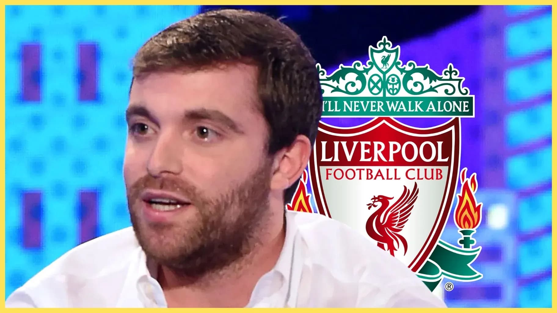 Analyst speaking with Liverpool FC logo in background