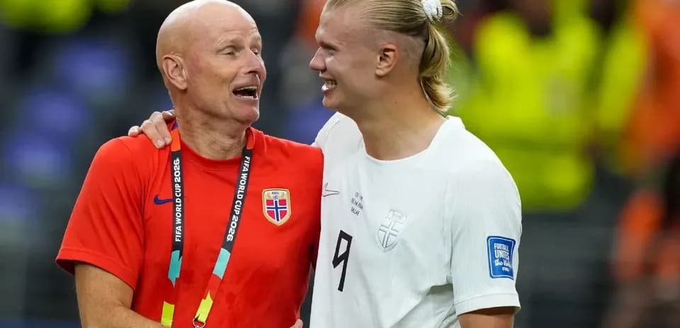 Norway coach and player celebrating after match