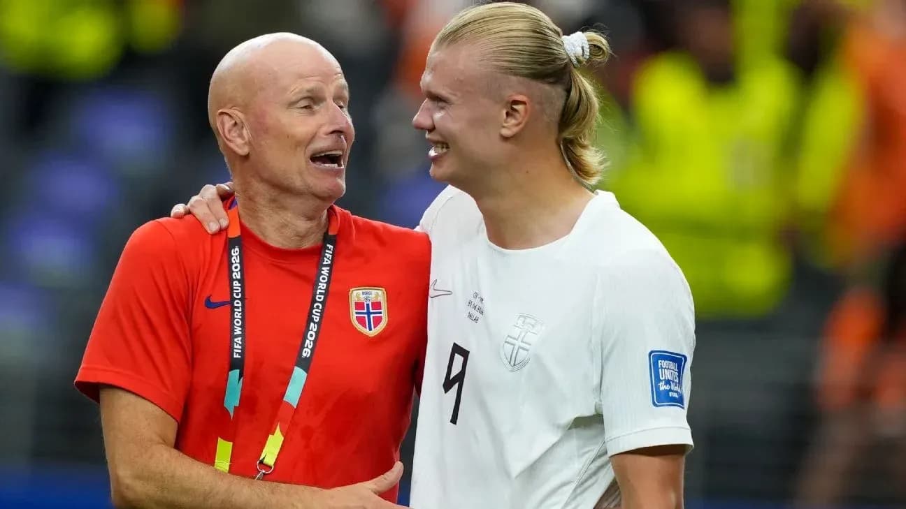 Norway coach and player celebrating after match