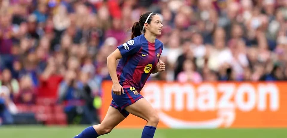 Barcelona player running on the pitch during match