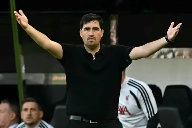 Coach gesturing during match from the sideline