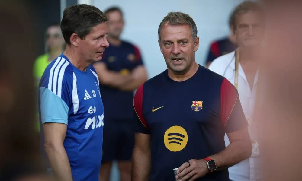 Coaches discussing during training session at Barcelona