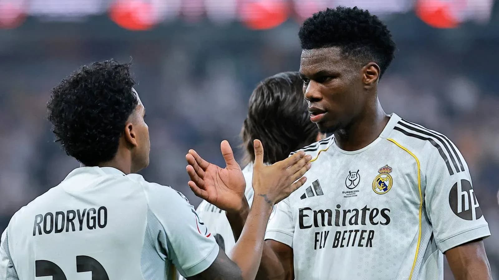 Rodrygo and Aurélien Tchouaméni discussing on the pitch