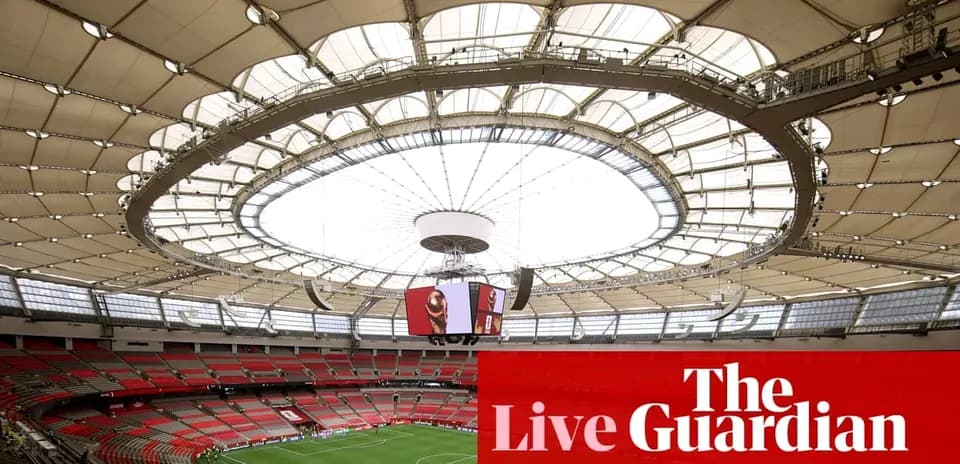 Stadium interior with a retractable roof and seating