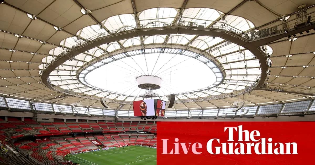 Stadium interior with a retractable roof and seating