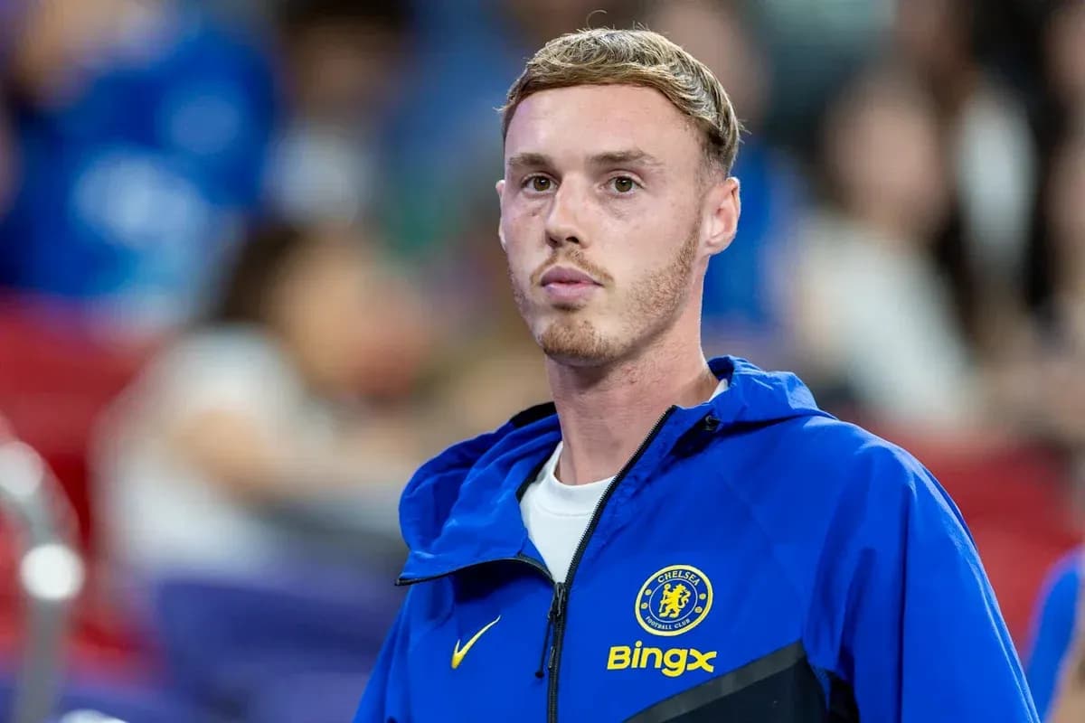 Chelsea player in training kit on sidelines
