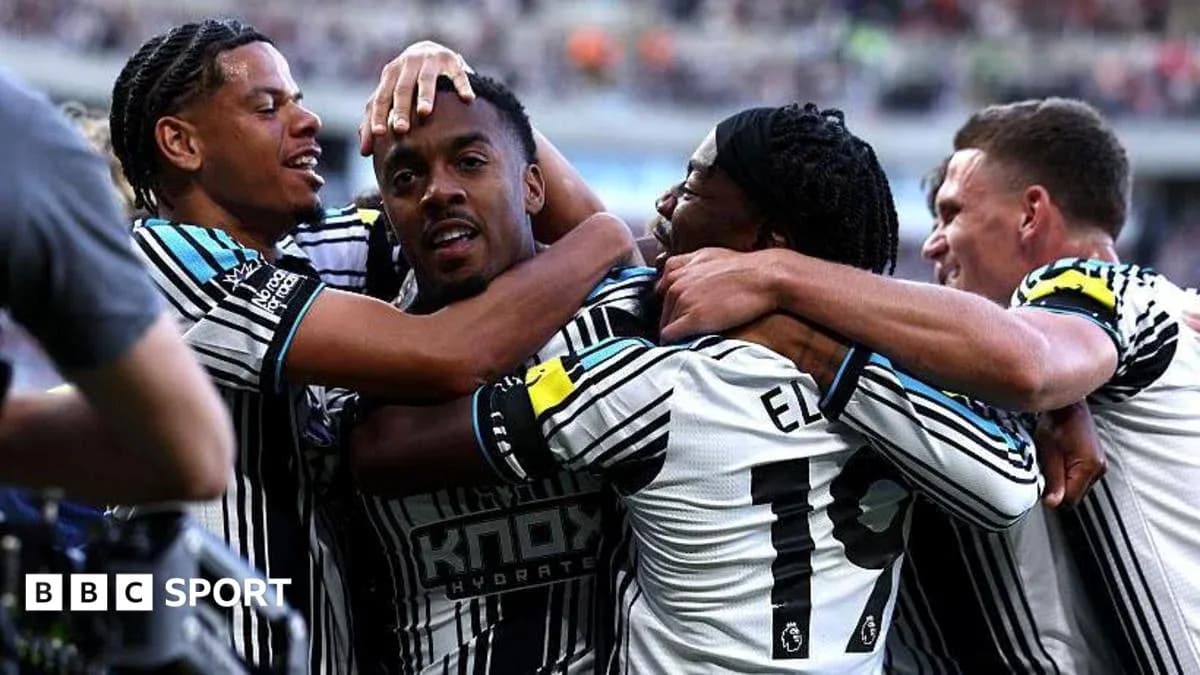 Newcastle players celebrating a goal together