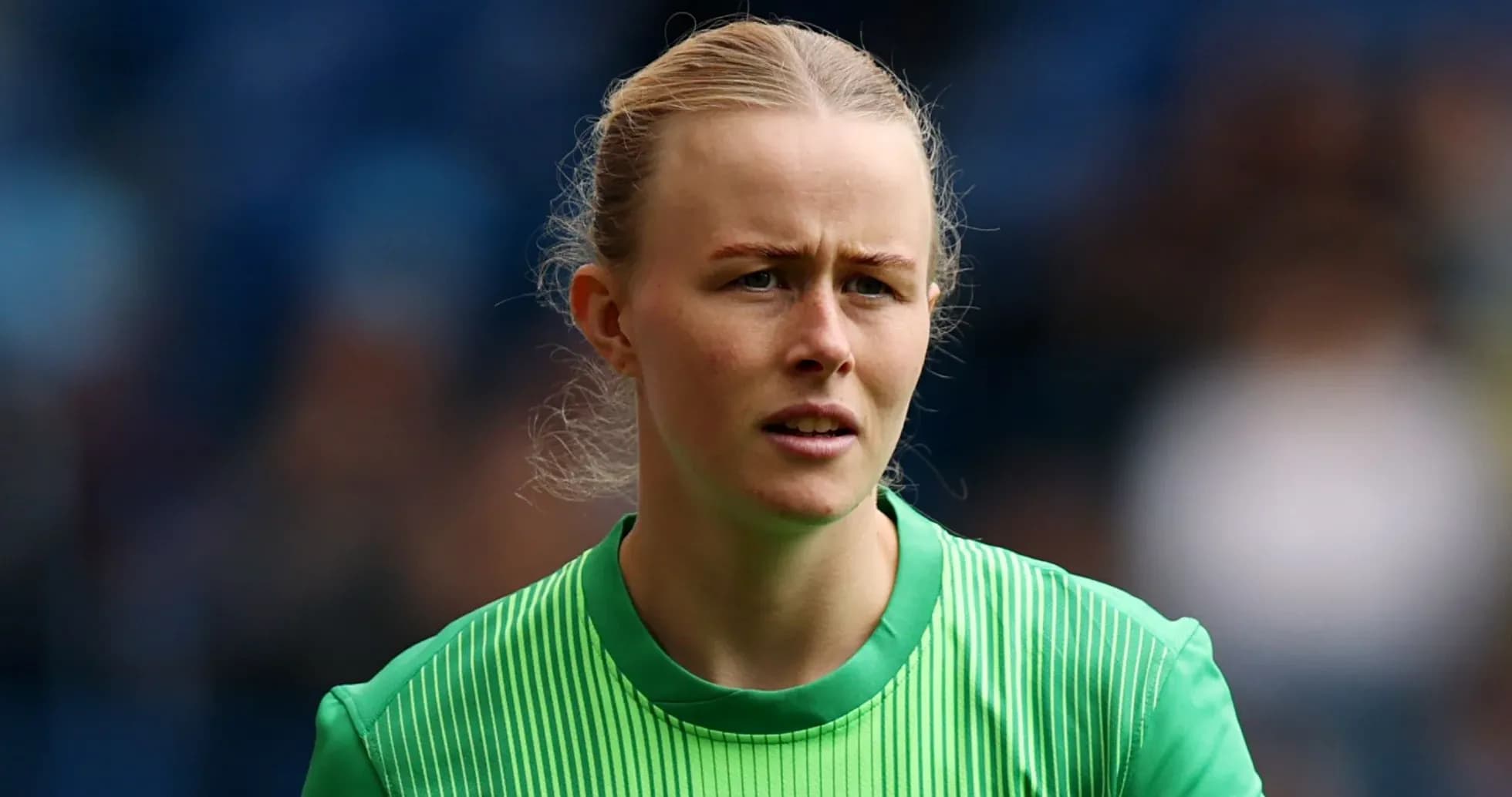 Goalkeeper wearing green jersey during match