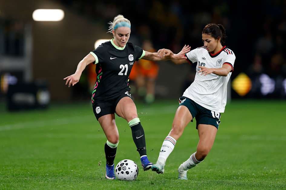 Two players competing for the ball during match