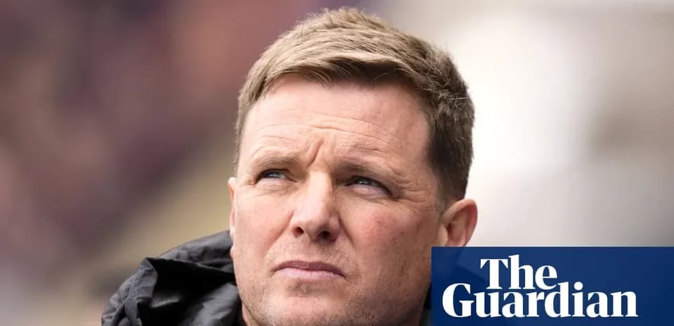 Men's football coach observing during a match