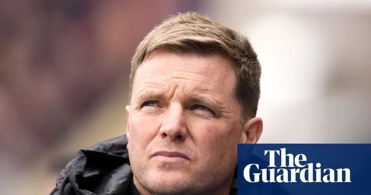 Men's football coach observing during a match