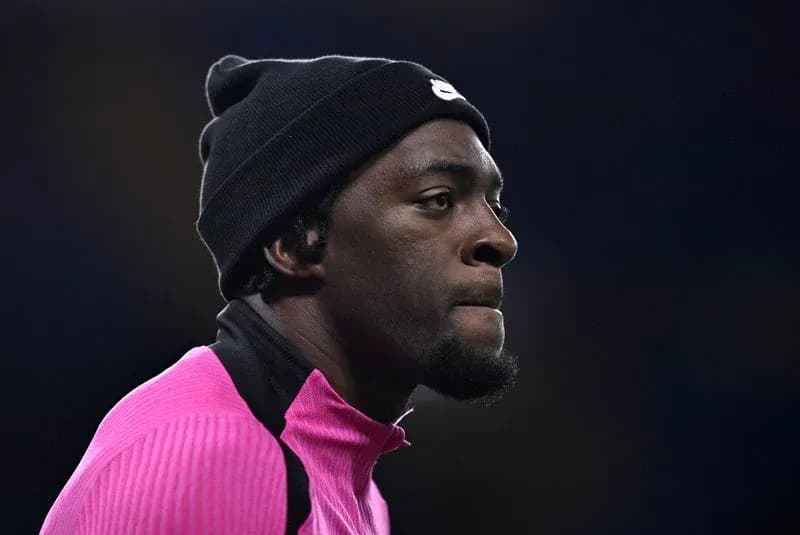Athlete in pink training gear during warm-up