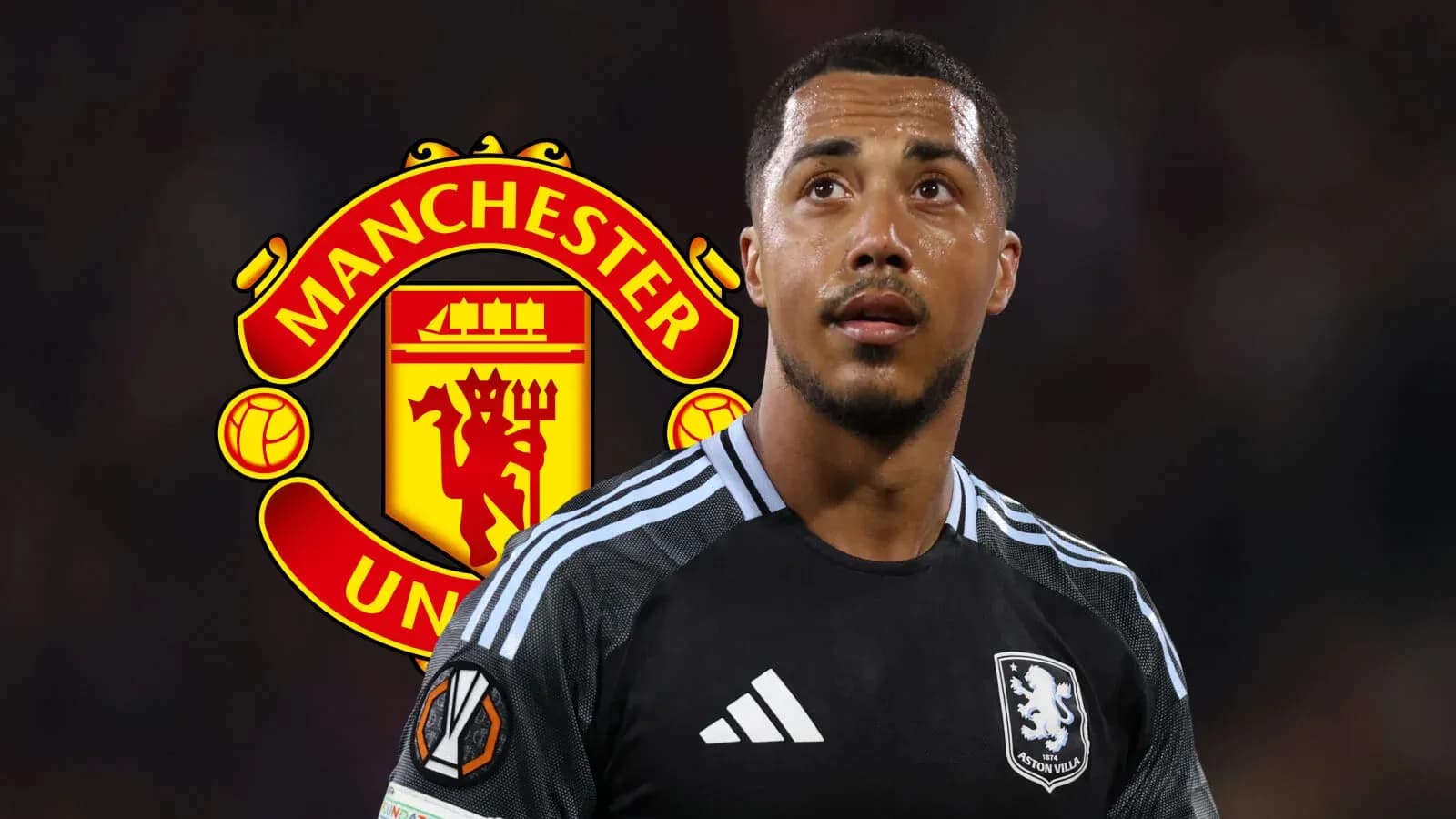 Aston Villa player in front of Manchester United logo