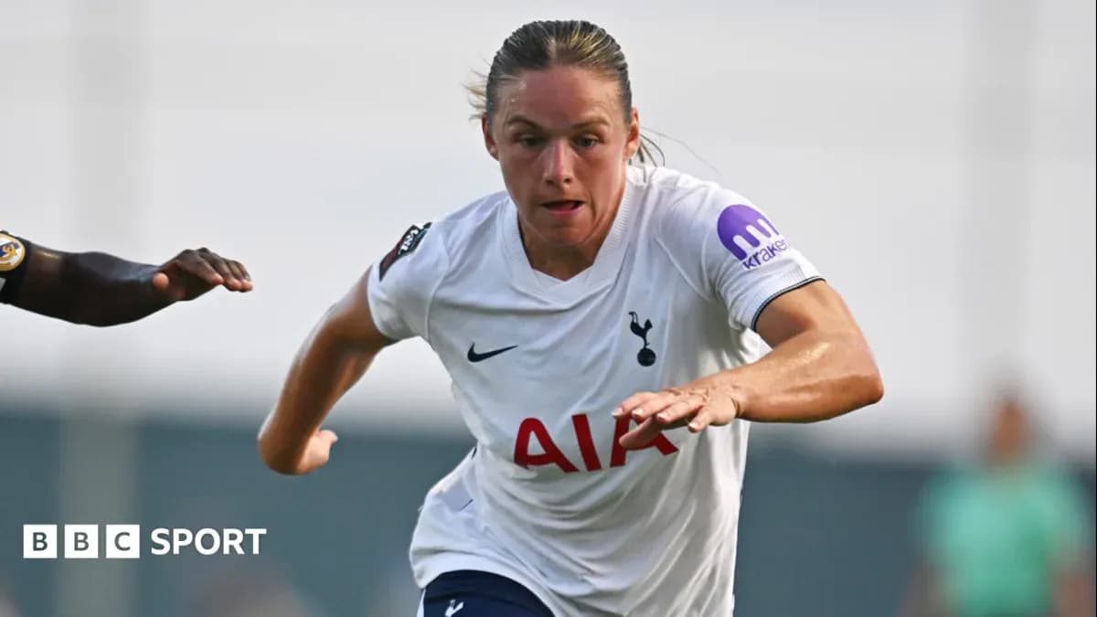 Tottenham player sprinting during a match