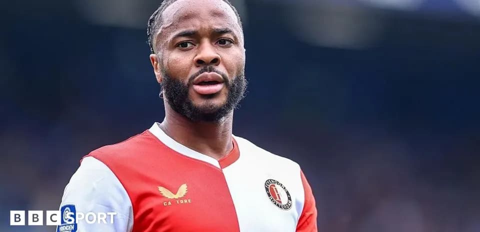 Feyenoord player in red and white kit during match