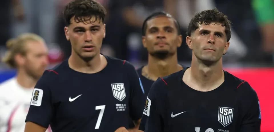 US national team players walking off the field