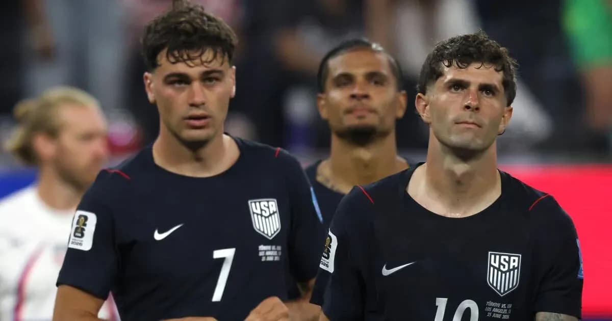 US national team players walking off the field