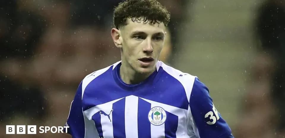 Wigan Athletic player in action during match