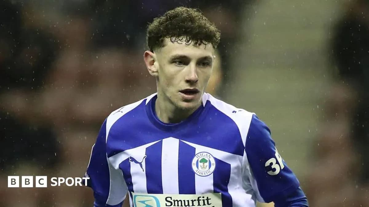 Wigan Athletic player in action during match