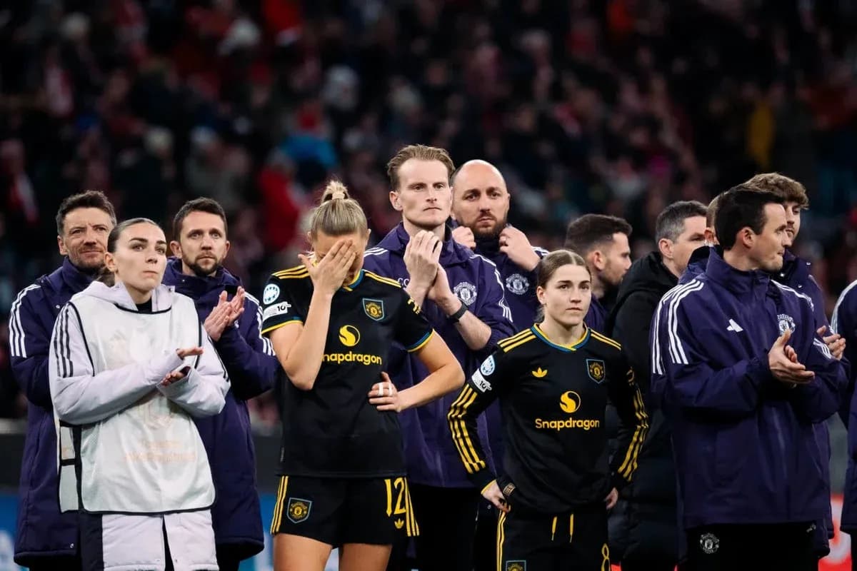 Players and staff observing a moment during match