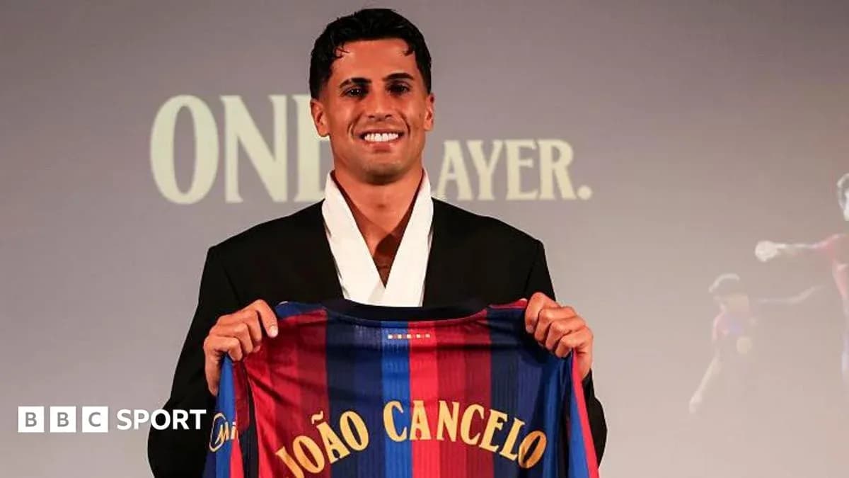 João Cancelo presenting Barcelona jersey at event